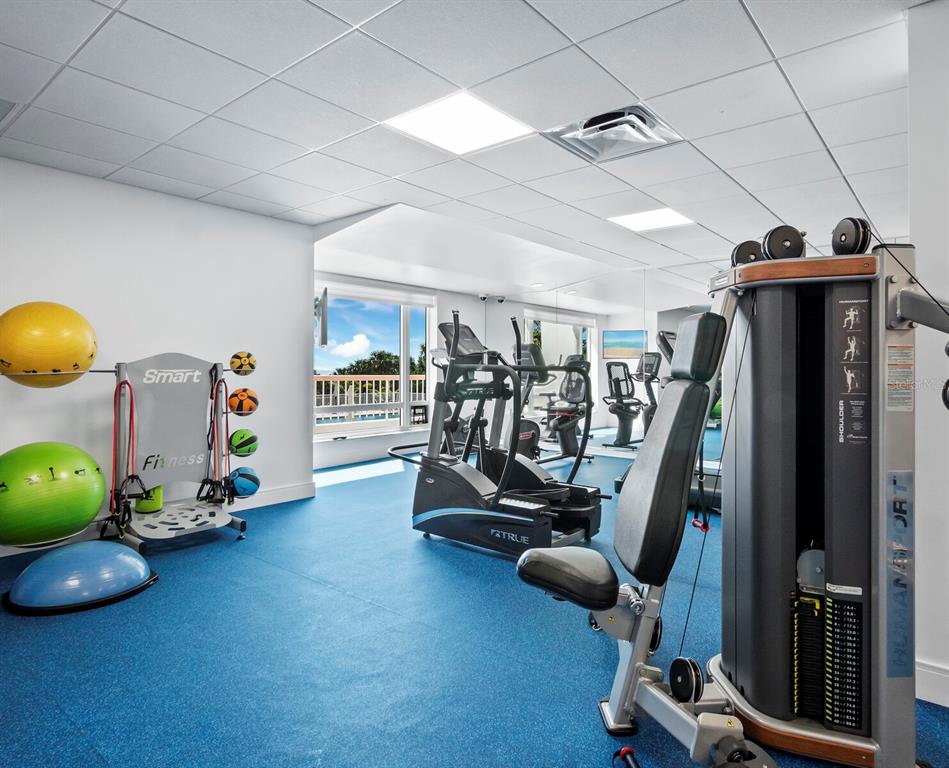 455 Longboat Club Road, Unit 402 Longboat Key, FL 34228 - Photo 33 of 50 a view of a room with gym equipment