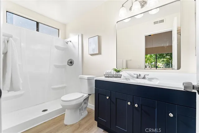 a workspace with furniture and wooden floor