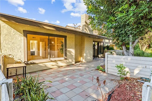 a front view of a house with a outdoor space