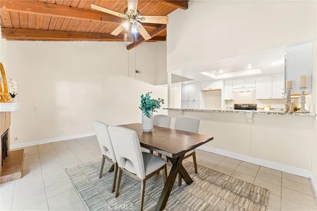 a kitchen with a stove sink and cabinets