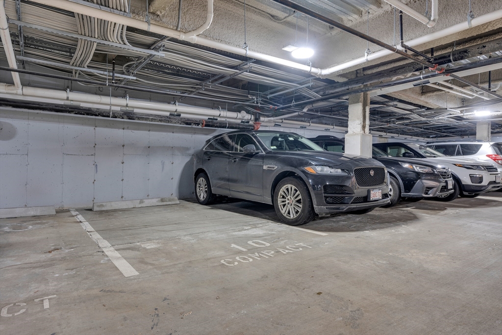 70 Leo M Birmingham Parkway, Unit U307 Boston, MA 02135 - Photo 14 of 35 a view of car parking