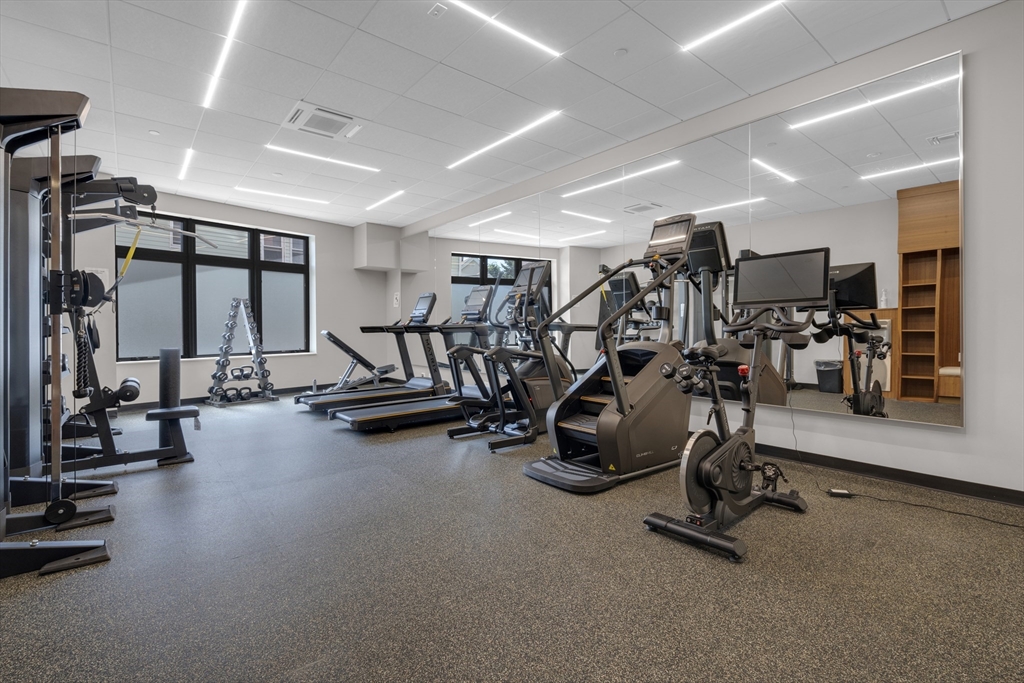 70 Leo M Birmingham Parkway, Unit U307 Boston, MA 02135 - Photo 16 of 35 a view of a room with gym equipment