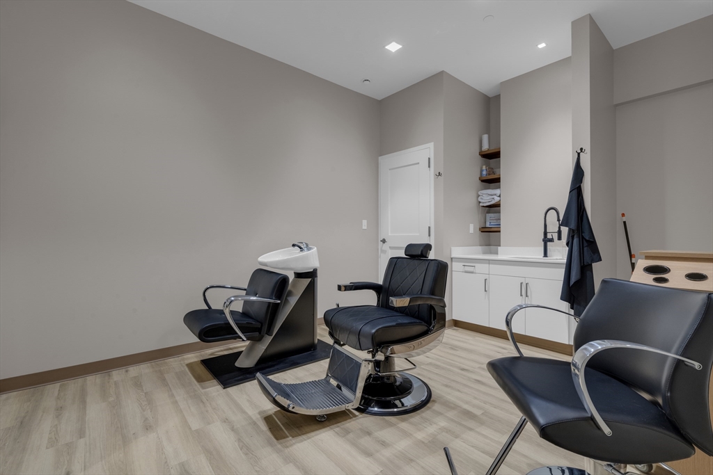 70 Leo M Birmingham Parkway, Unit U307 Boston, MA 02135 - Photo 32 of 35 a work room with furniture