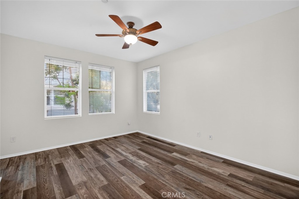 14 Valmont Way Ladera Ranch, CA 92694 - Photo 17 of 39 wooden floor in an empty room with a window