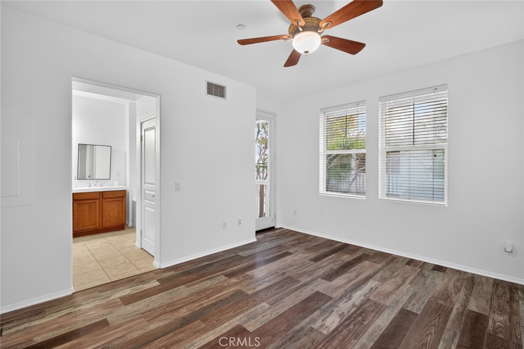 14 Valmont Way Ladera Ranch, CA 92694 - Photo 18 of 39 wooden floor in an empty room with a window