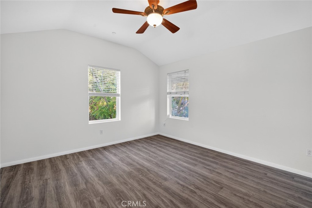 14 Valmont Way Ladera Ranch, CA 92694 - Photo 27 of 39 wooden floor in an empty room with a window