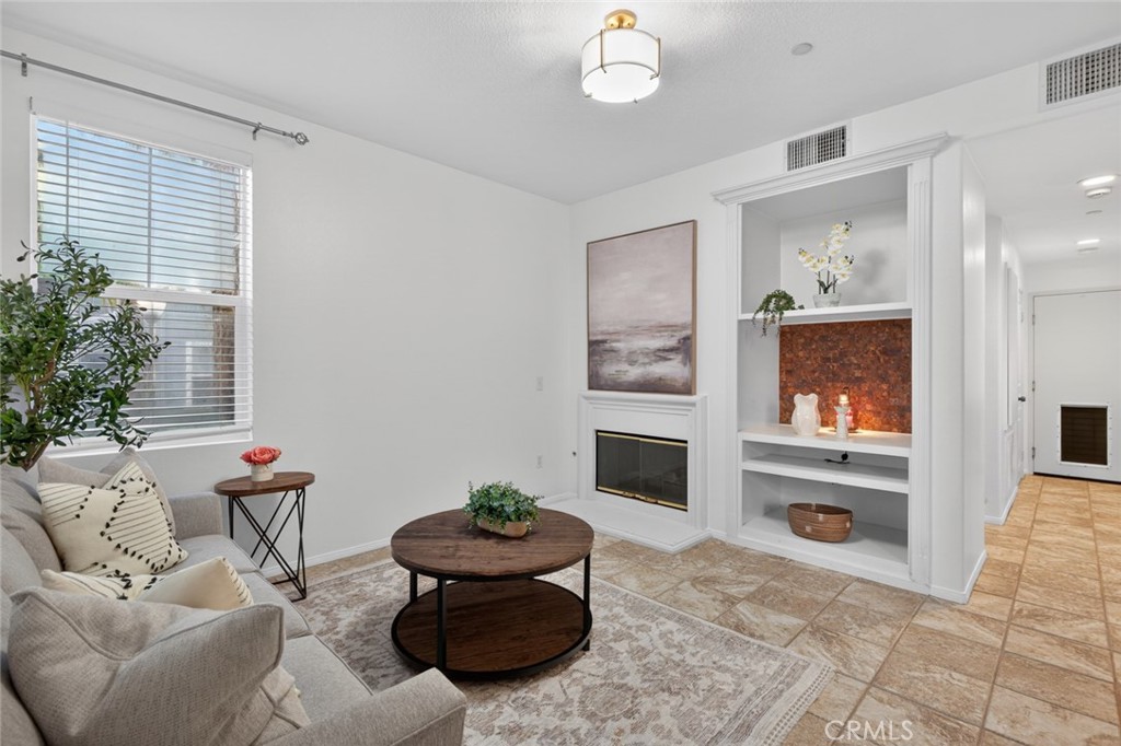 14 Valmont Way Ladera Ranch, CA 92694 - Photo 3 of 39 a living room with furniture and a window