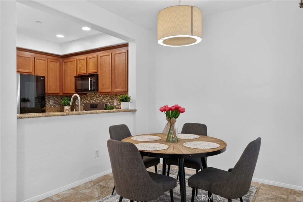14 Valmont Way Ladera Ranch, CA 92694 - Photo 6 of 39 a view of a dining room with furniture