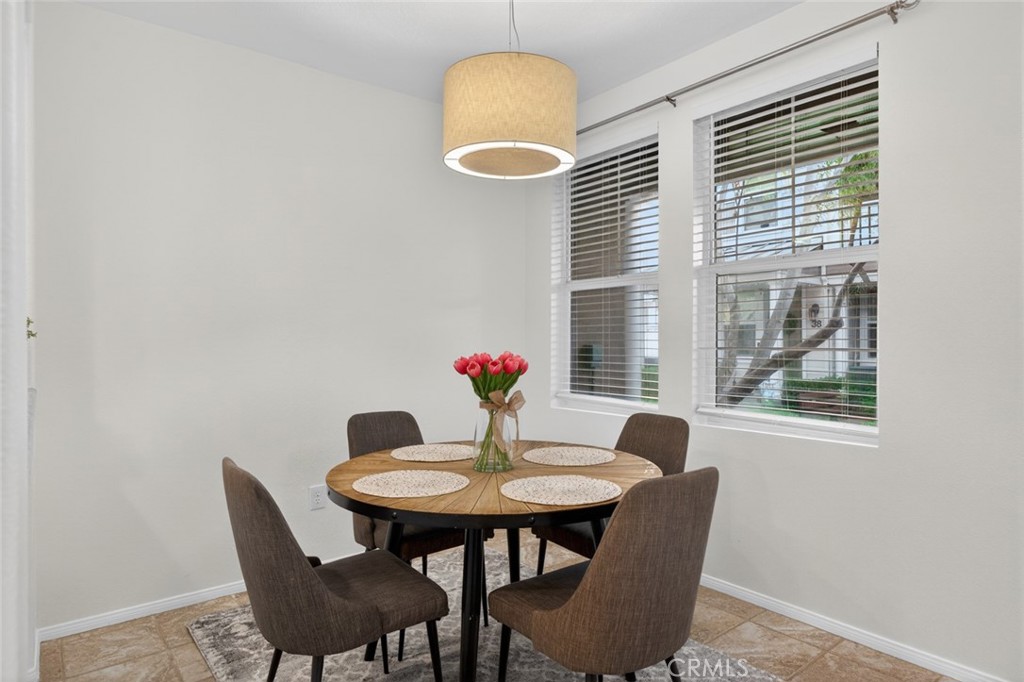 14 Valmont Way Ladera Ranch, CA 92694 - Photo 7 of 39 a dining room with furniture and window