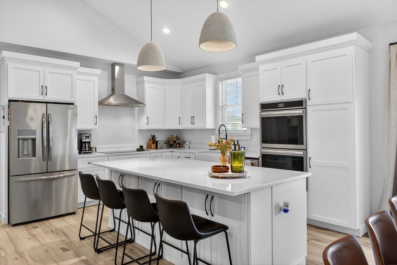 475 Beauford Road Harrisonburg, VA 22801 - Photo 11 of 75 a kitchen with stainless steel appliances a stove a refrigerator a sink a stove a dining table and chairs