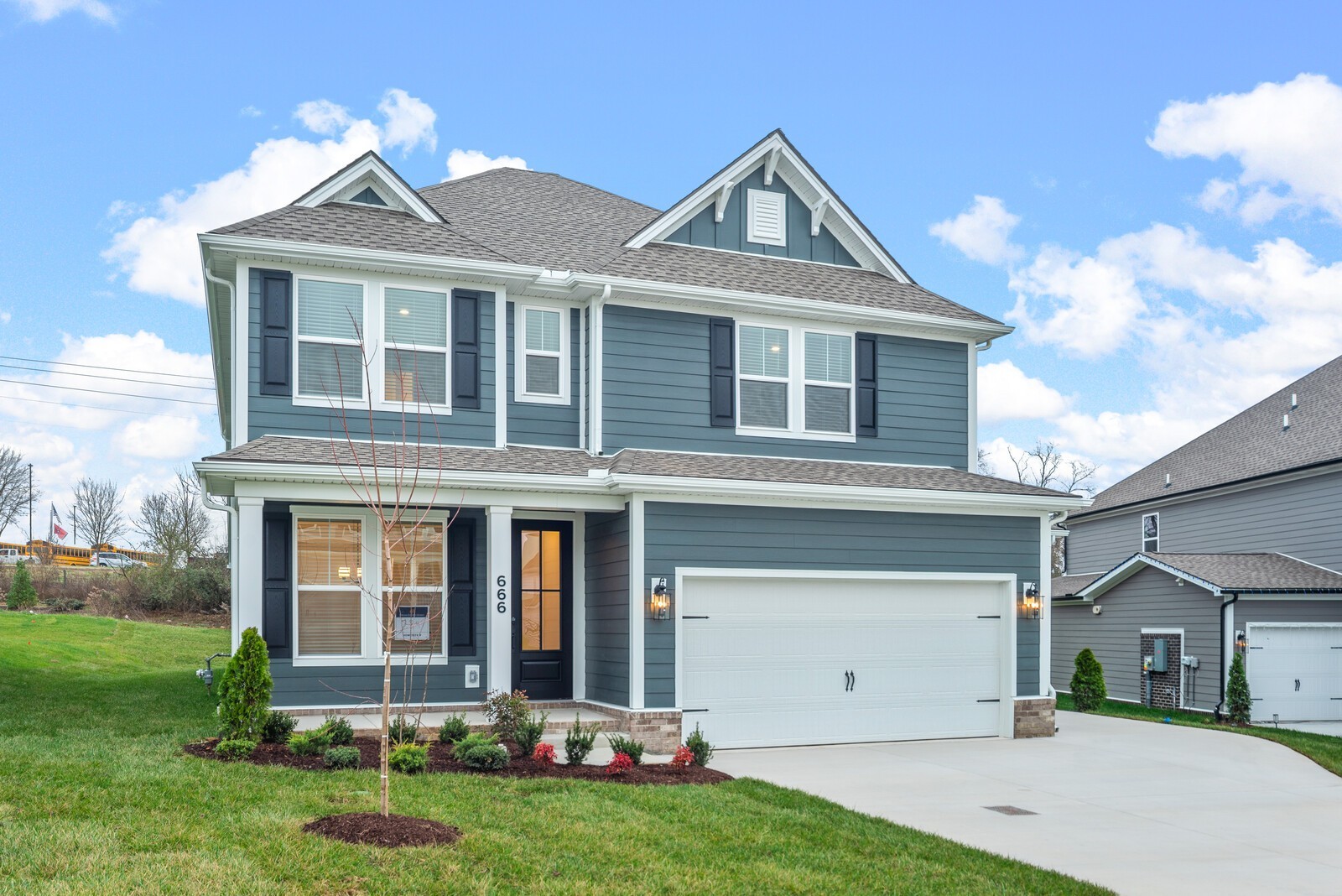 666 Conifer Drive Spring Hill, TN 37174 - Photo 3 of 64 front view of a house with a yard