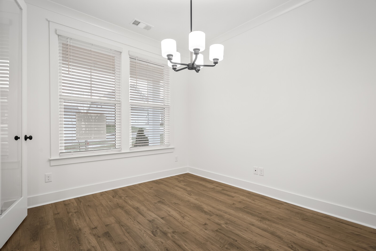 666 Conifer Drive Spring Hill, TN 37174 - Photo 35 of 64 a view of a room with wooden floor and chandelier