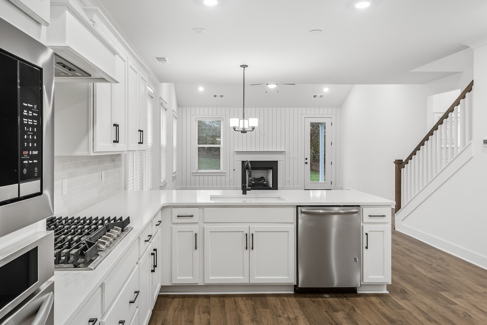666 Conifer Drive Spring Hill, TN 37174 - Photo 38 of 64 a kitchen with white cabinets and appliances