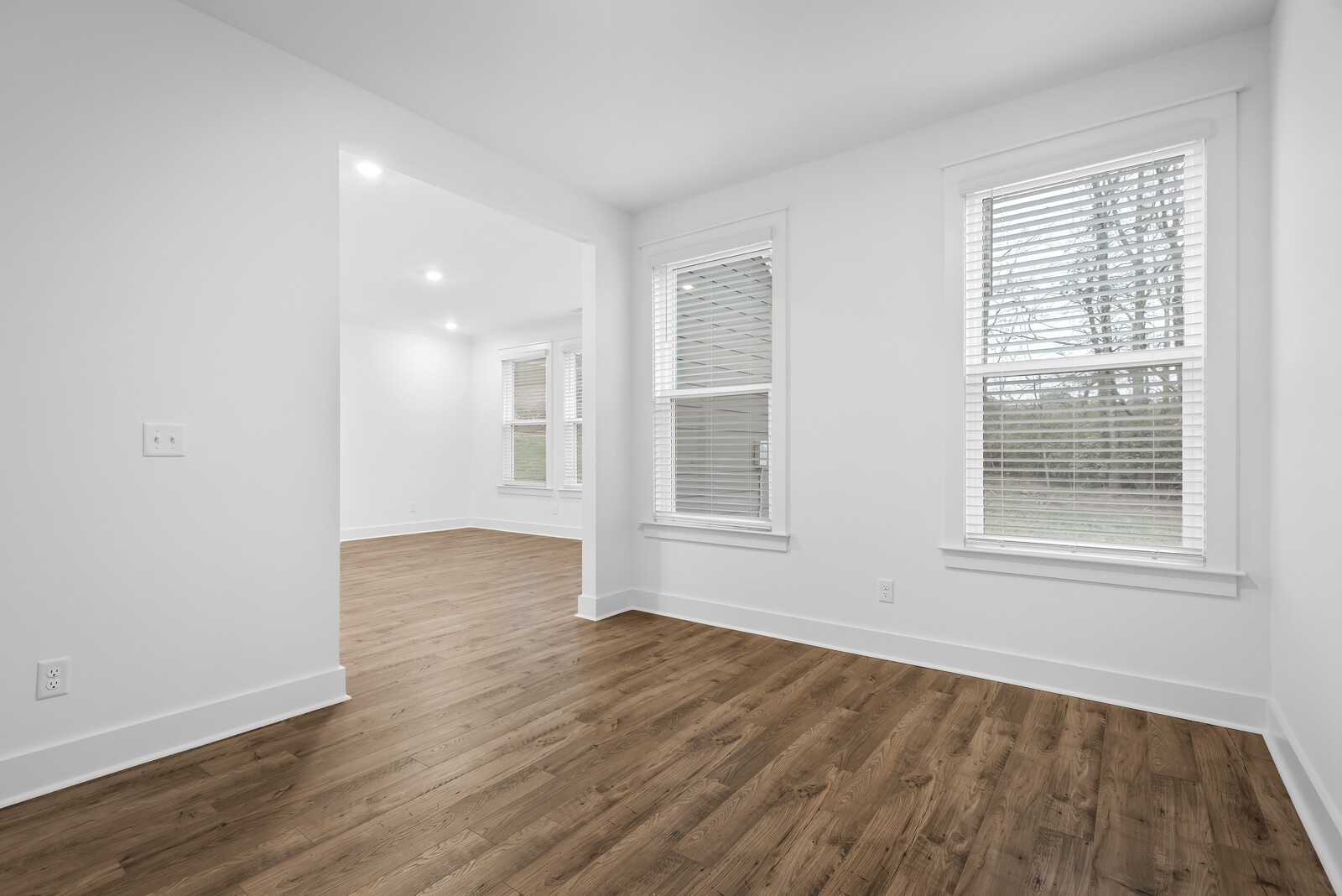 666 Conifer Drive Spring Hill, TN 37174 - Photo 50 of 64 an empty room with wooden floor and windows