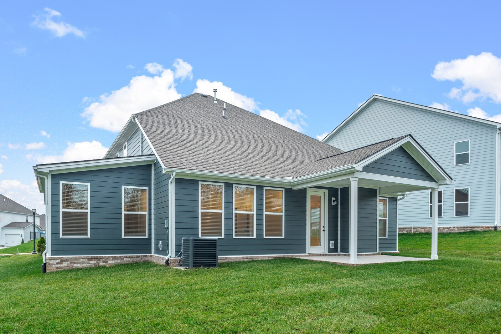666 Conifer Drive Spring Hill, TN 37174 - Photo 5 of 64 a view of a house with a yard and plants