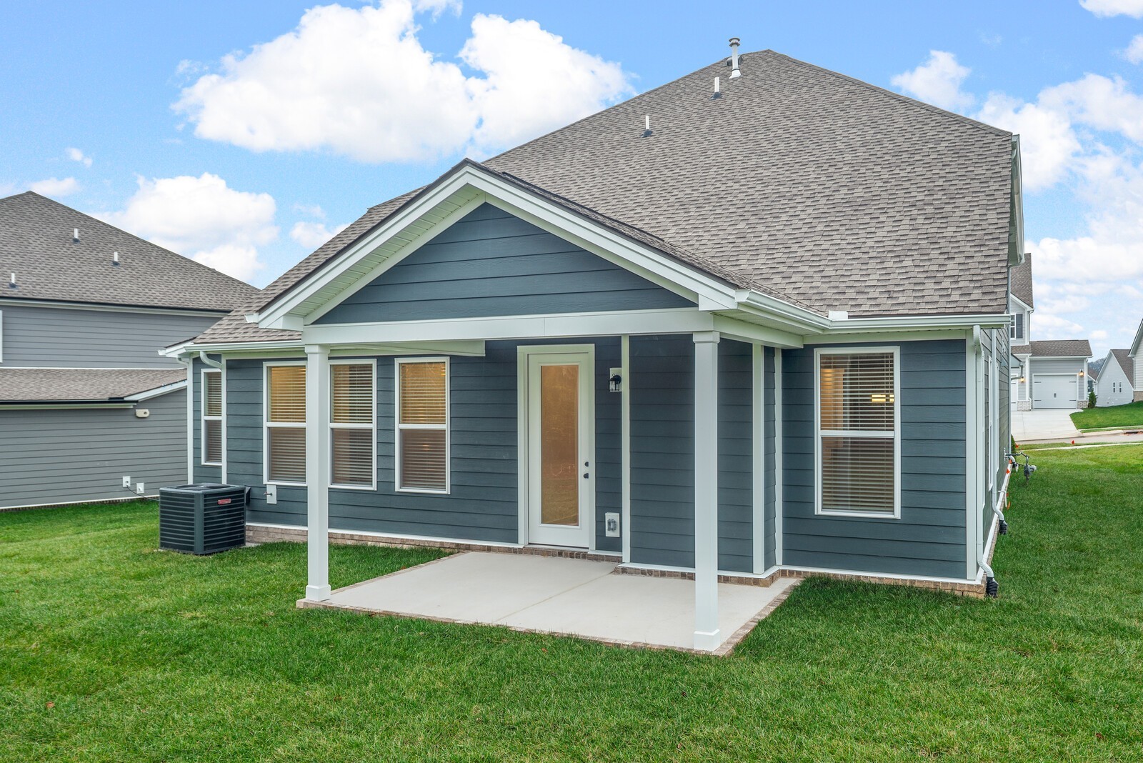 666 Conifer Drive Spring Hill, TN 37174 - Photo 6 of 64 a view of an house with backyard and porch
