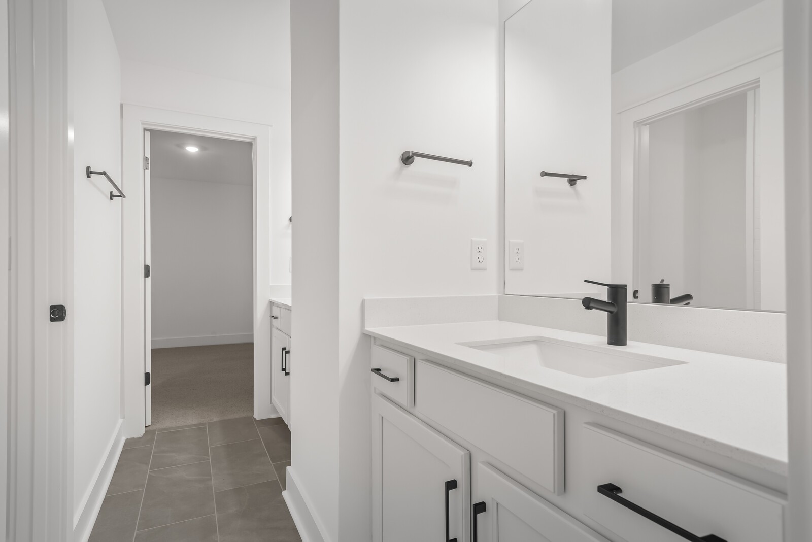 666 Conifer Drive Spring Hill, TN 37174 - Photo 62 of 64 a bathroom with a sink and a mirror