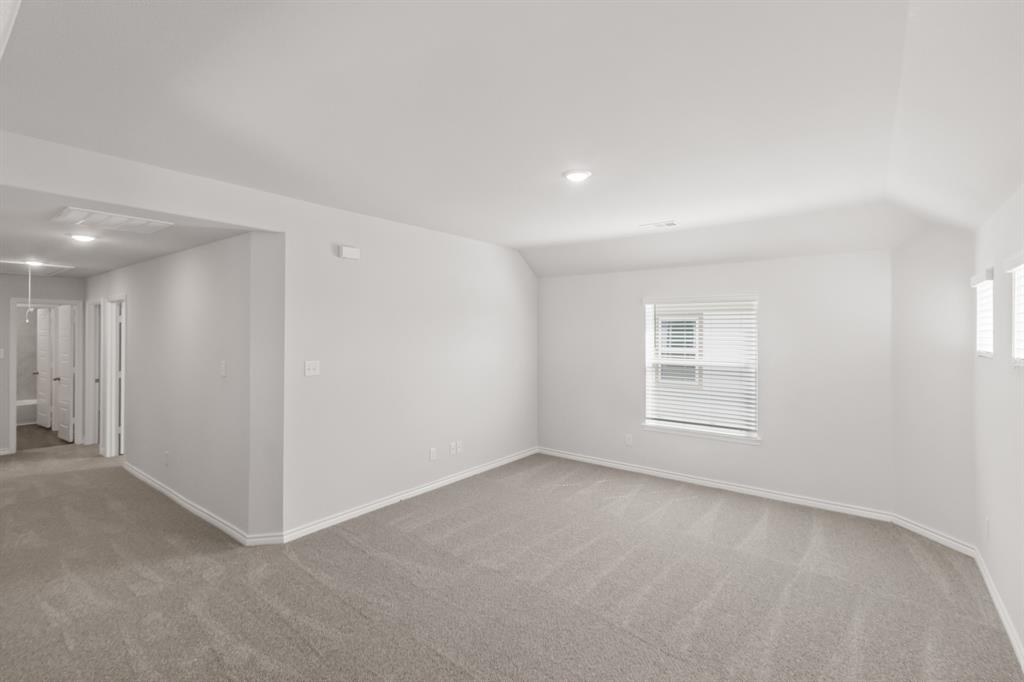 1009 Wind Drift Way Fort Worth, TX 76131 - Photo 9 of 40 an empty room with windows