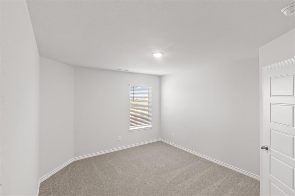 1009 Wind Drift Way Fort Worth, TX 76131 - Photo 10 of 40 an empty room with windows