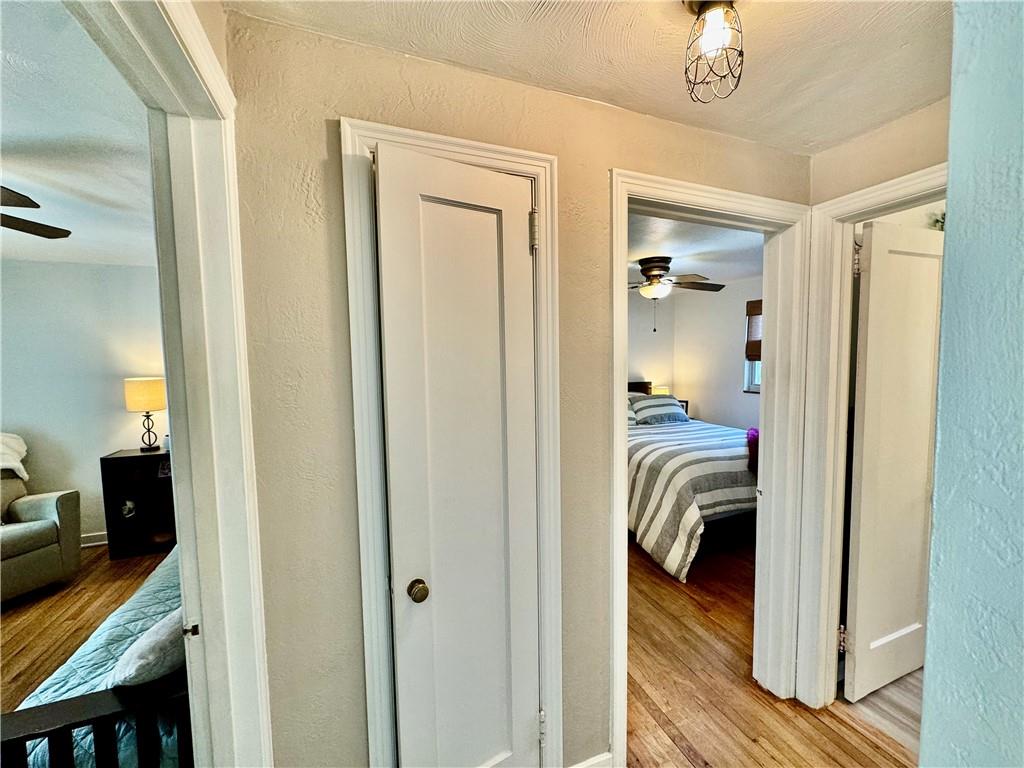 213 Logan Road Bethel Park, PA 15102 - Photo 16 of 47 a view of a hallway with a livingroom and a bathroom