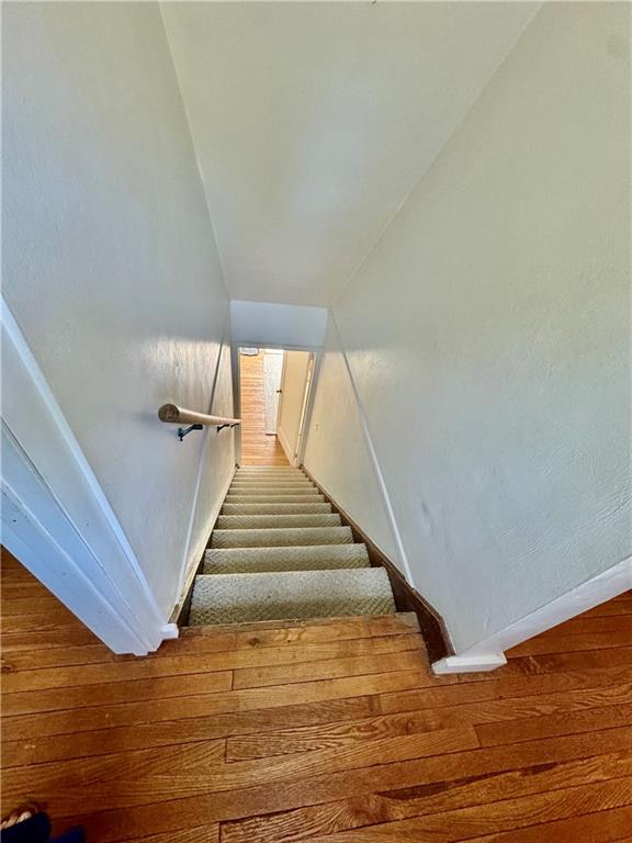 213 Logan Road Bethel Park, PA 15102 - Photo 29 of 47 a view of entryway and hall with wooden floor