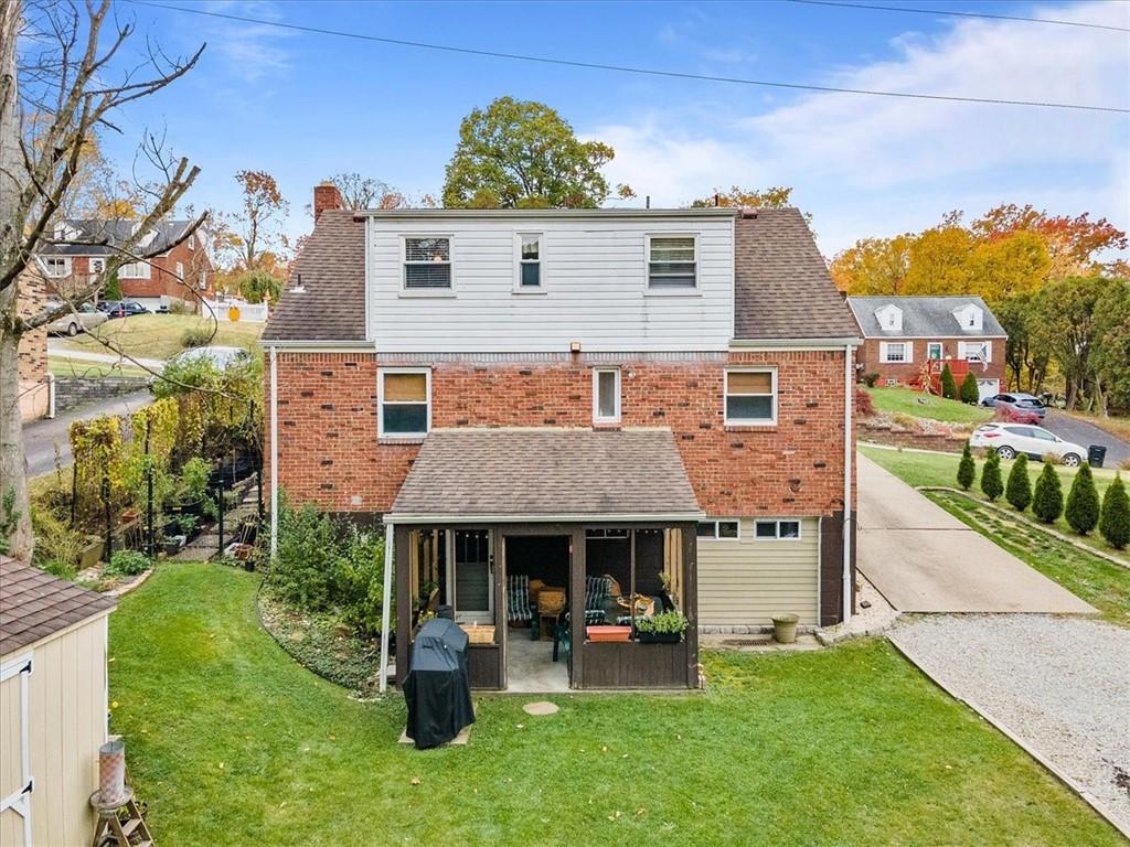 213 Logan Road Bethel Park, PA 15102 - Photo 37 of 47 a front view of a house with a yard