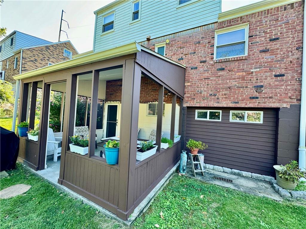 213 Logan Road Bethel Park, PA 15102 - Photo 38 of 47 a view of a house with a porch and furniture