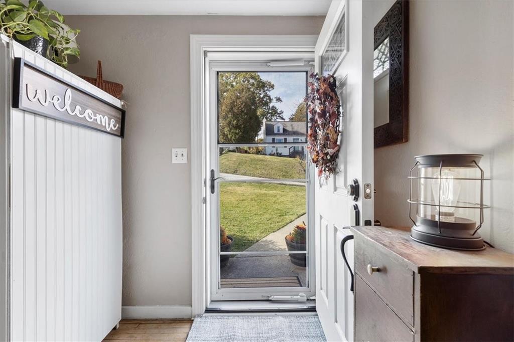 213 Logan Road Bethel Park, PA 15102 - Photo 4 of 47 a bathroom with a granite countertop shower a mirror and a sink
