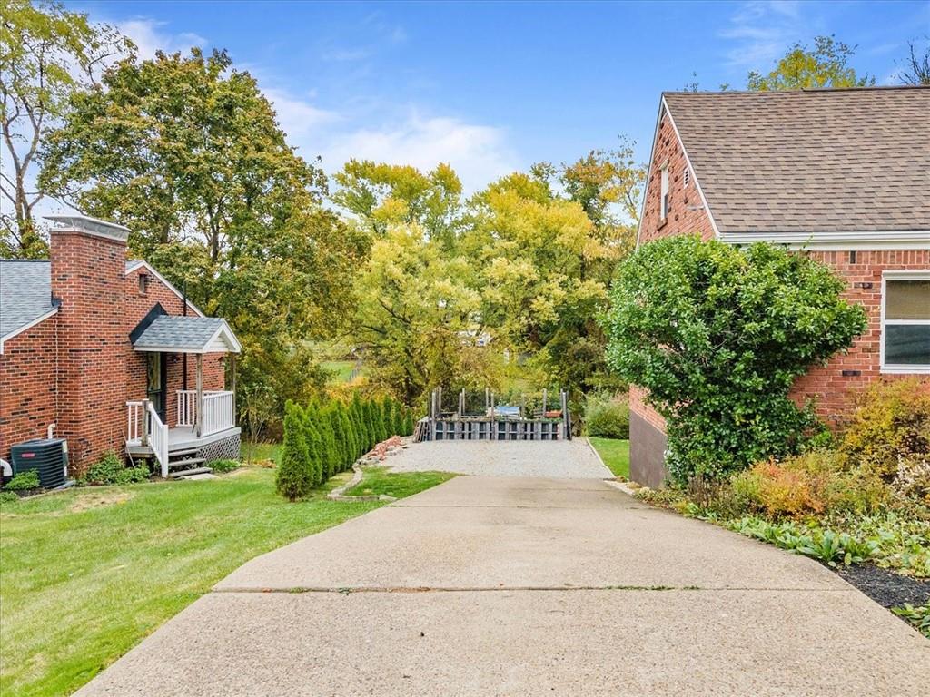 213 Logan Road Bethel Park, PA 15102 - Photo 46 of 47 front view of a house with a yard