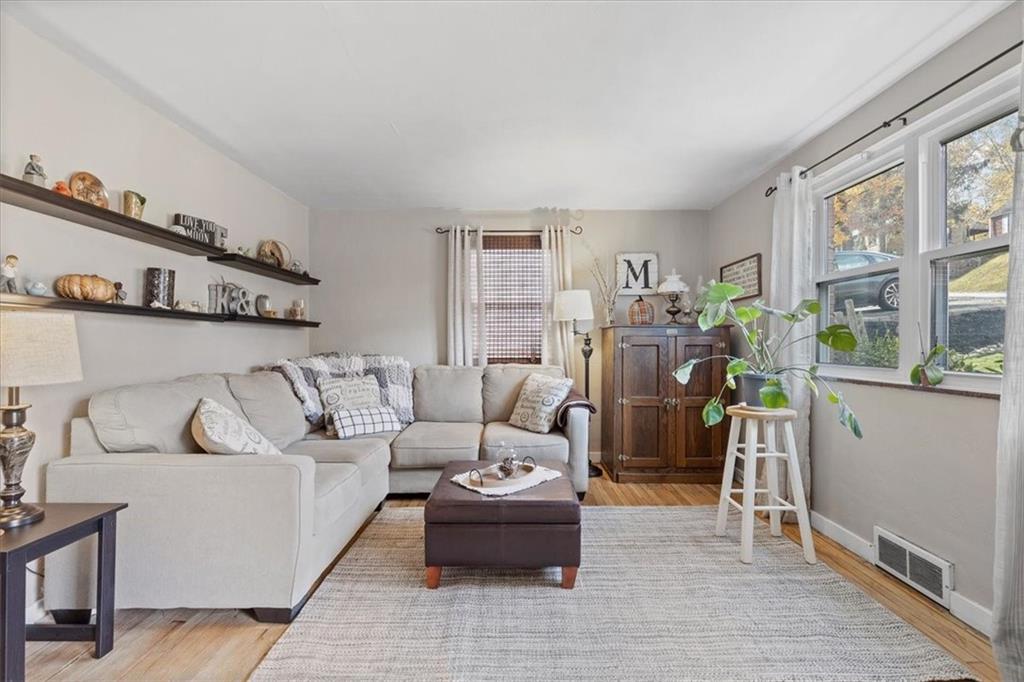 213 Logan Road Bethel Park, PA 15102 - Photo 6 of 47 a living room with furniture and a table