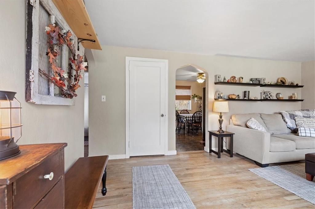 213 Logan Road Bethel Park, PA 15102 - Photo 10 of 47 a living room with furniture and a fireplace