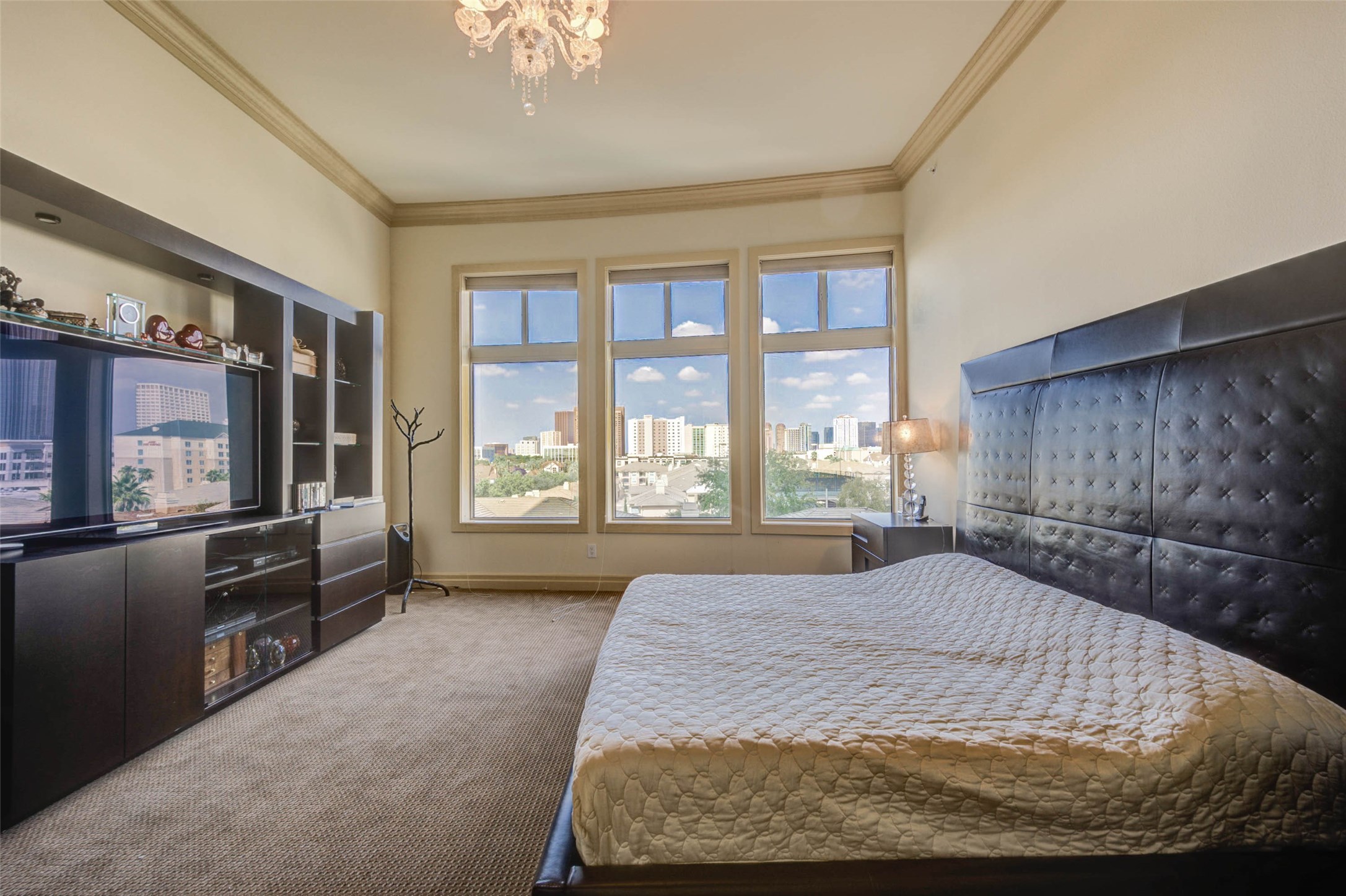 3388 Sage Road, Unit 502 Houston, TX 77056 - Photo 24 of 30 Enjoy this luxurious master bedroom with an incredible view.