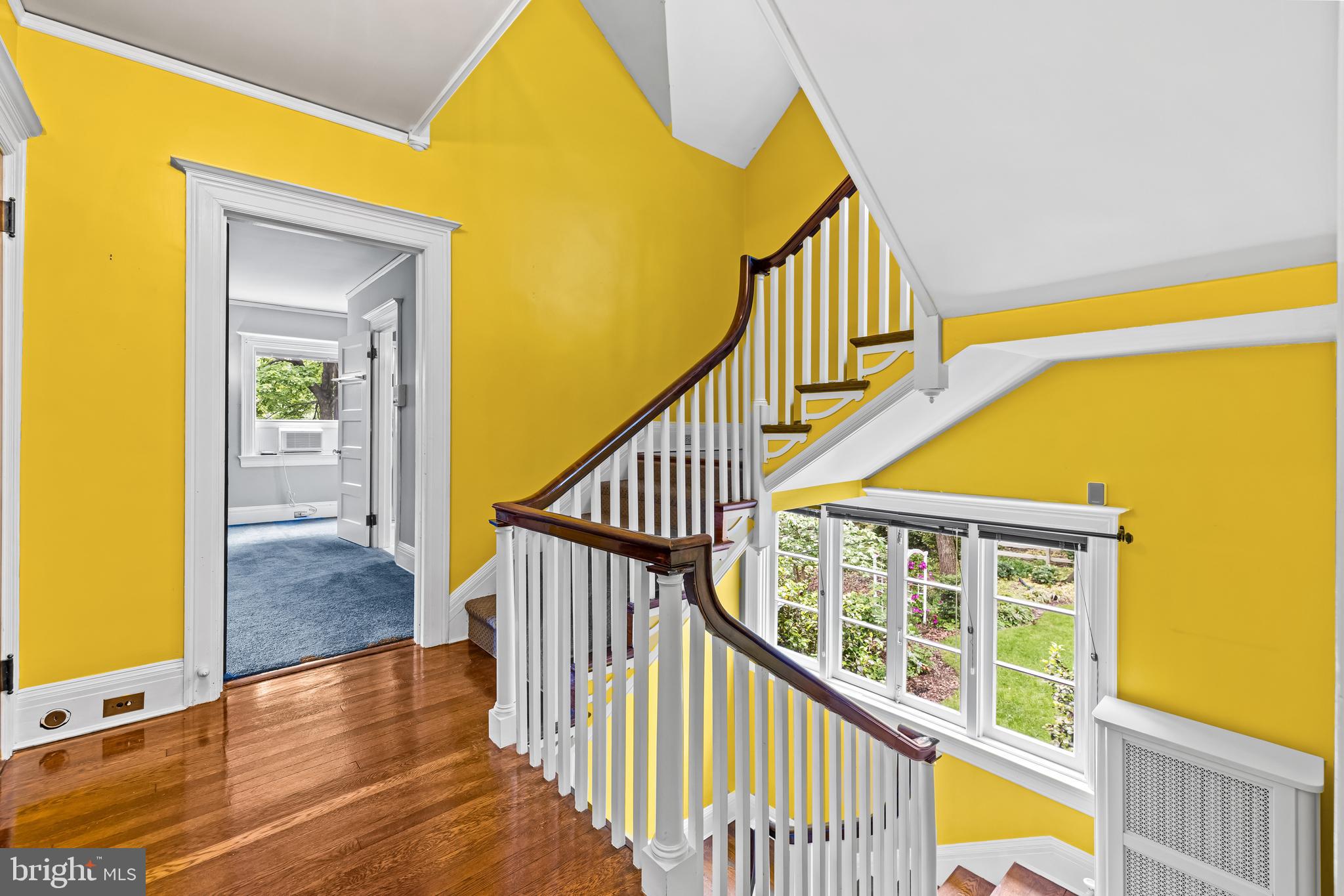4406 Norwood Road Baltimore, MD 21218 - Photo 34 of 74 a view of staircase with black and white walls
