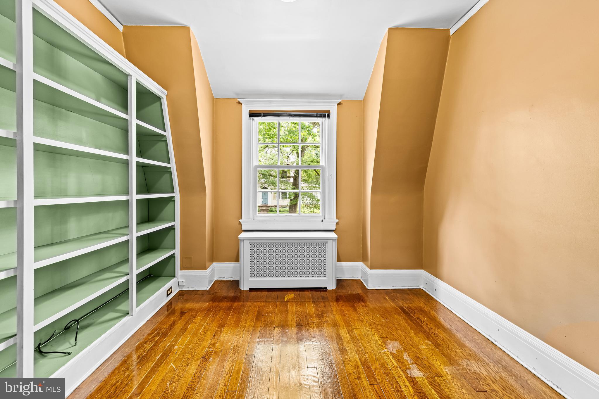 4406 Norwood Road Baltimore, MD 21218 - Photo 40 of 74 a view of a room with wooden floor and a window