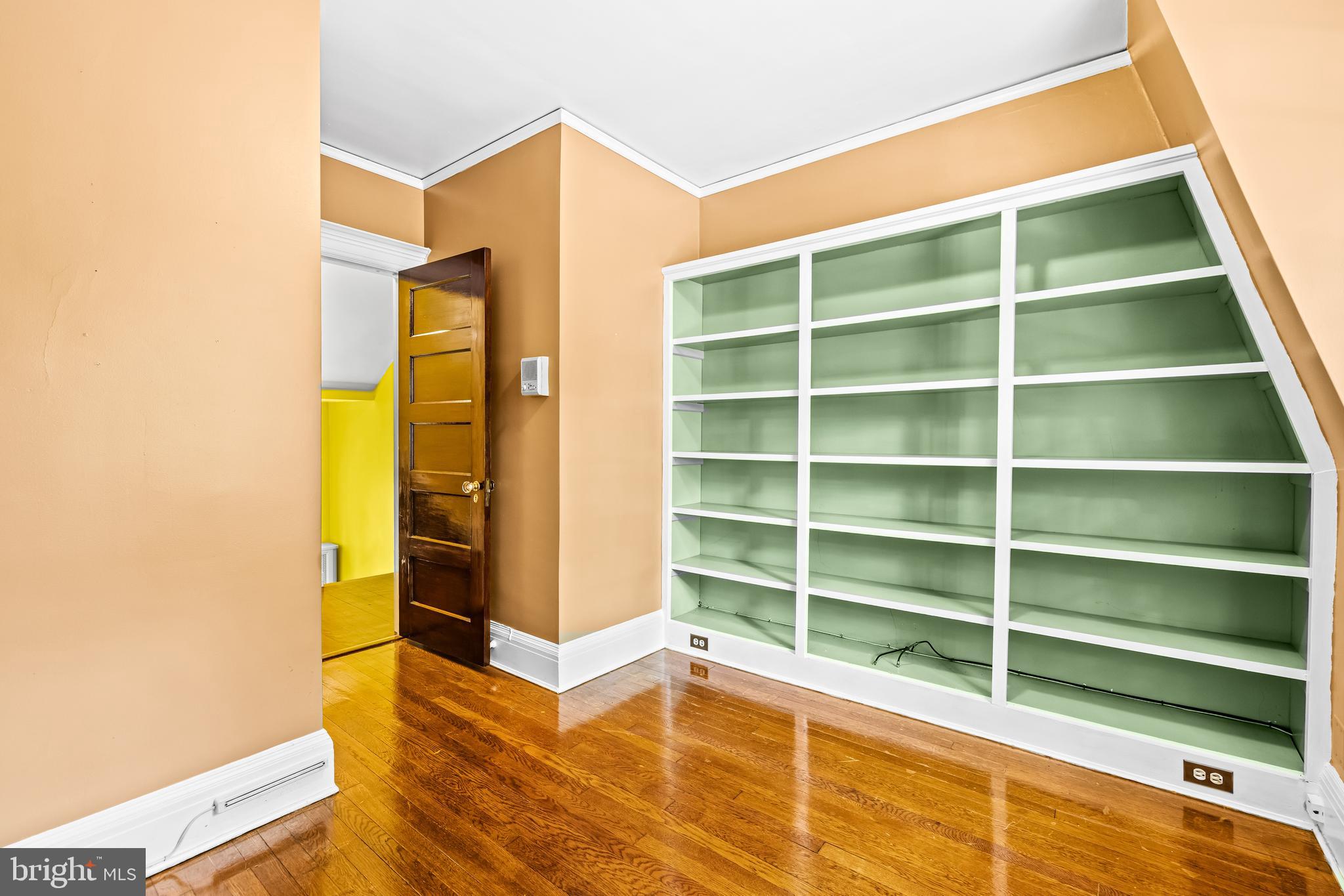 4406 Norwood Road Baltimore, MD 21218 - Photo 41 of 74 a view of an empty room with empty shelves