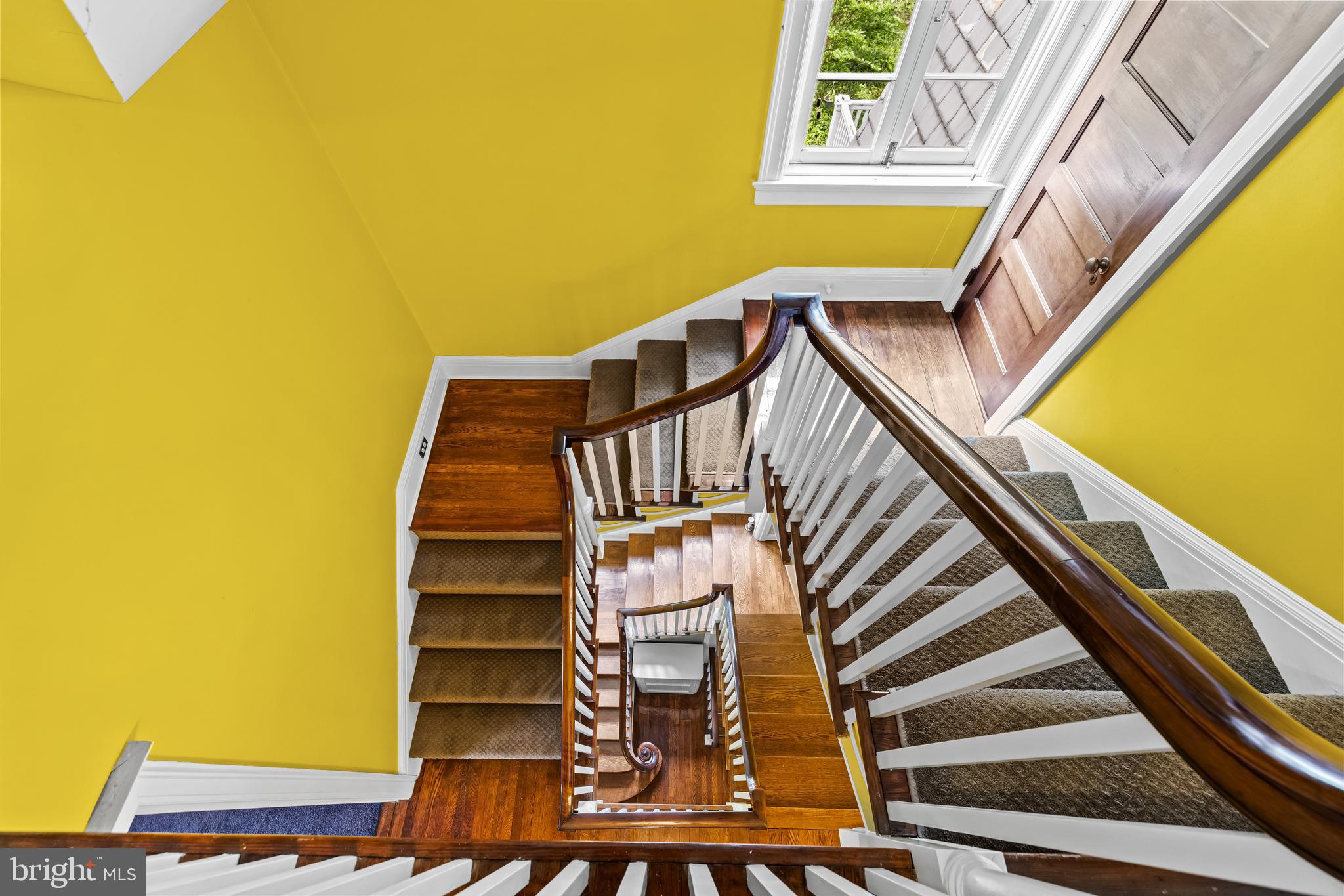 4406 Norwood Road Baltimore, MD 21218 - Photo 50 of 74 a view of stairs and with wooden floor