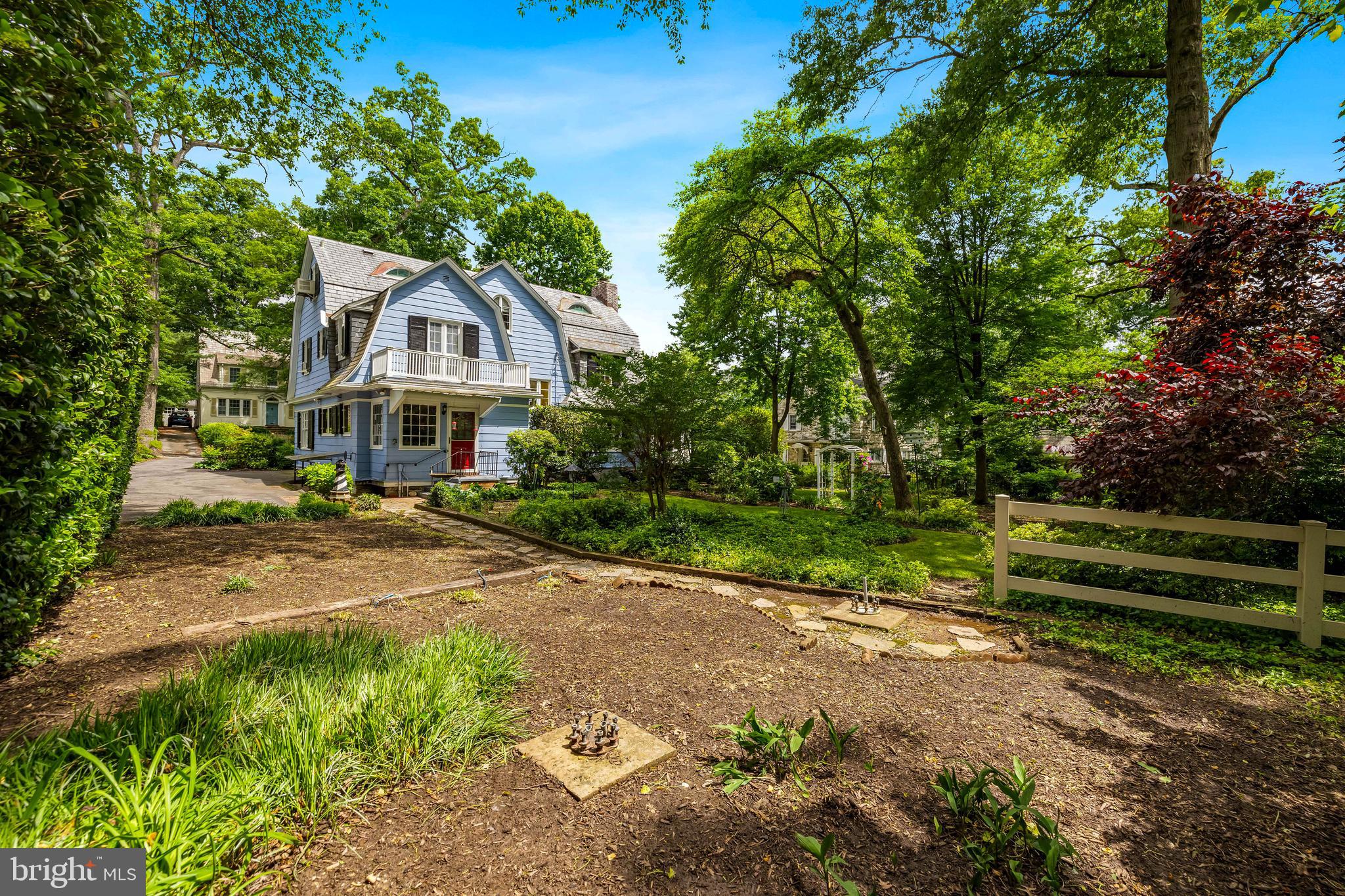 4406 Norwood Road Baltimore, MD 21218 - Photo 62 of 74 a front view of a house with a yard
