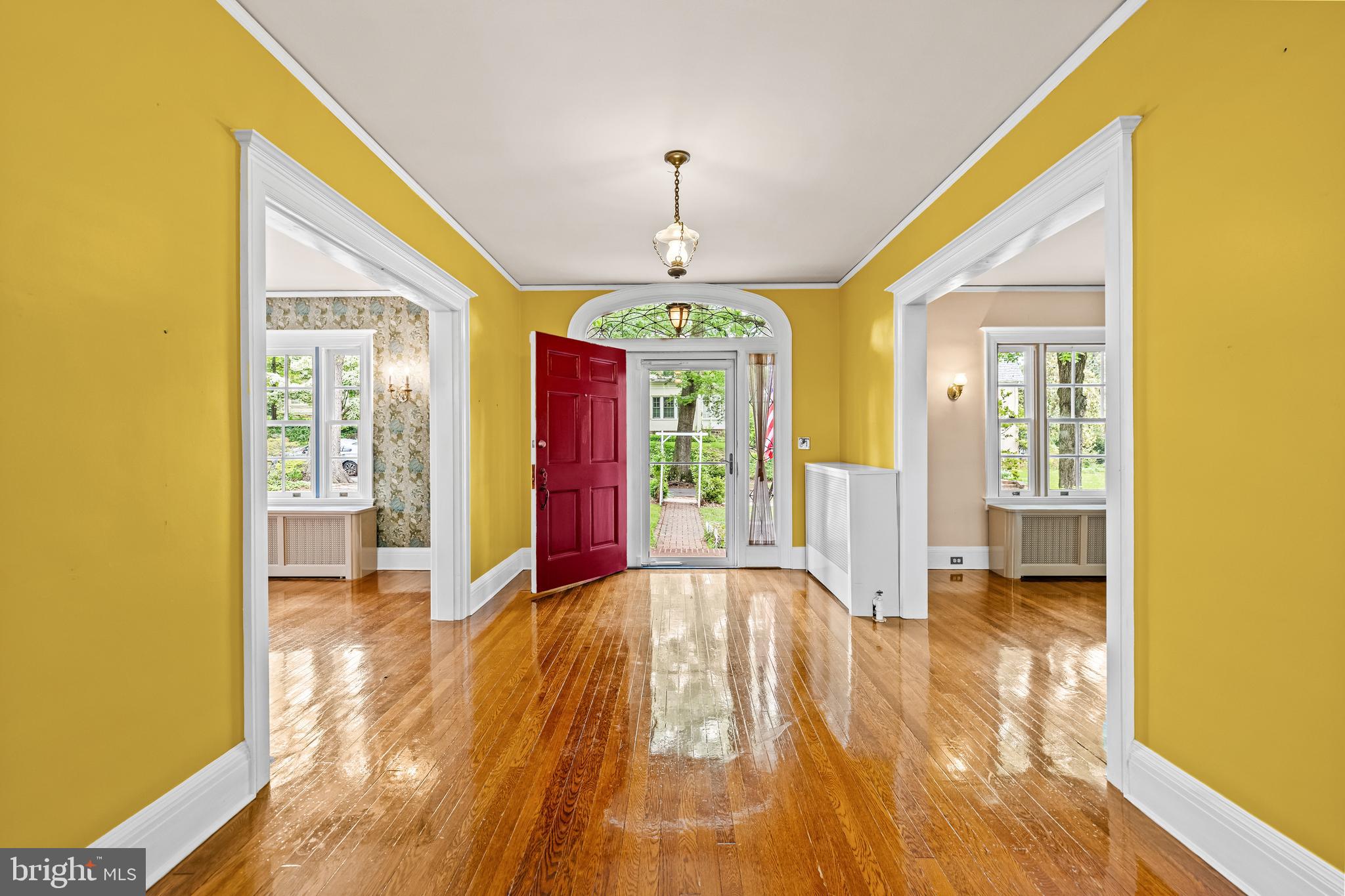 4406 Norwood Road Baltimore, MD 21218 - Photo 8 of 74 a view of an entryway with wooden floor and windows