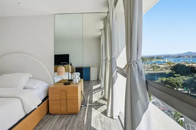 a room with furniture and a flat screen tv