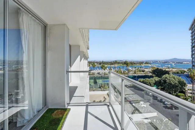 a view of balcony with furniture