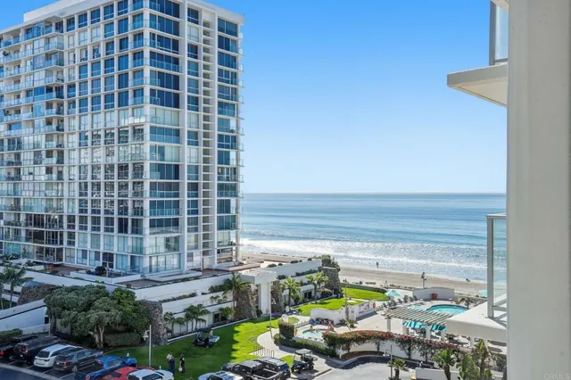a utility room with dryer and plants
