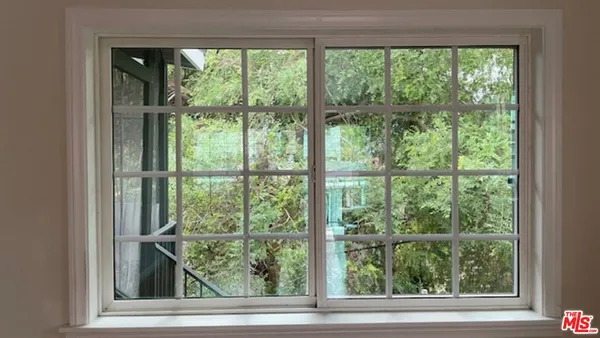 a view of a room that has a window