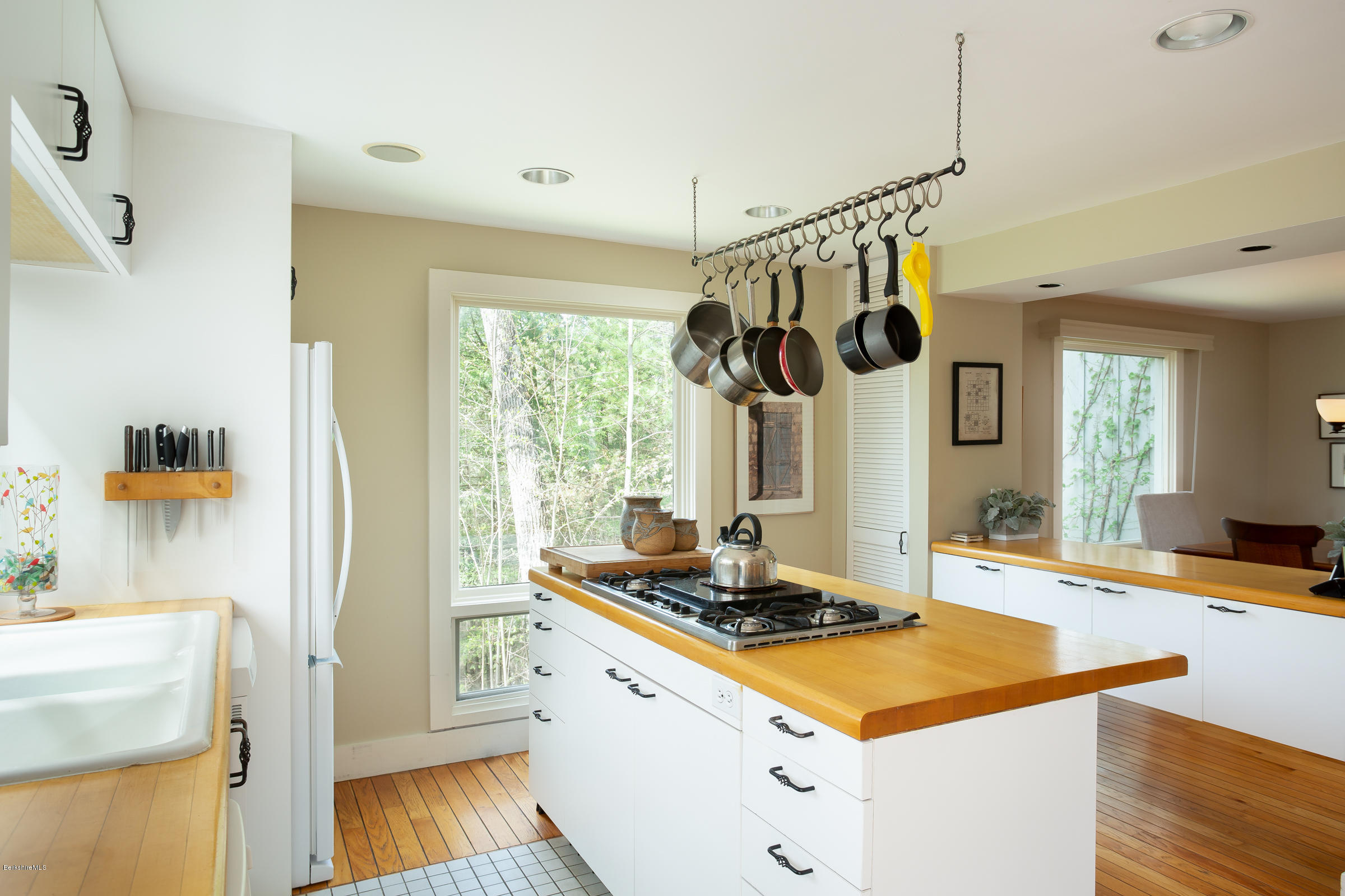 4 Castle Hill Road Stockbridge, MA 01262 - Photo 8 of 20 a kitchen with a refrigerator and a stove top oven