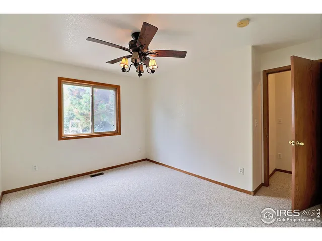 a bathroom with a sink a toilet and a shower