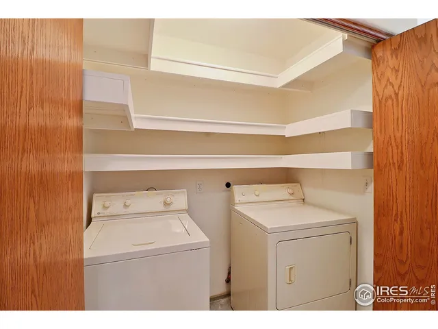 a view of a kitchen with a dishwasher and cabinets