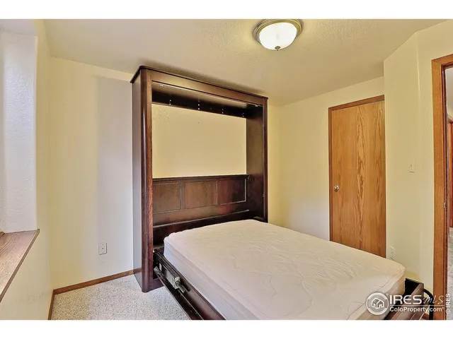 a bathroom with a sink toilet a mirror and shower