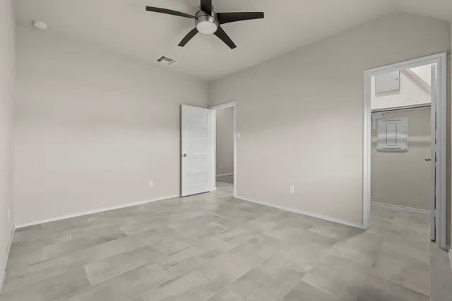 a view of a backyard of the house