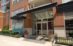 111 South Morgan Street, Unit 906 Chicago, IL 60607 - Photo 1 of 1 a front view of a house with a garden