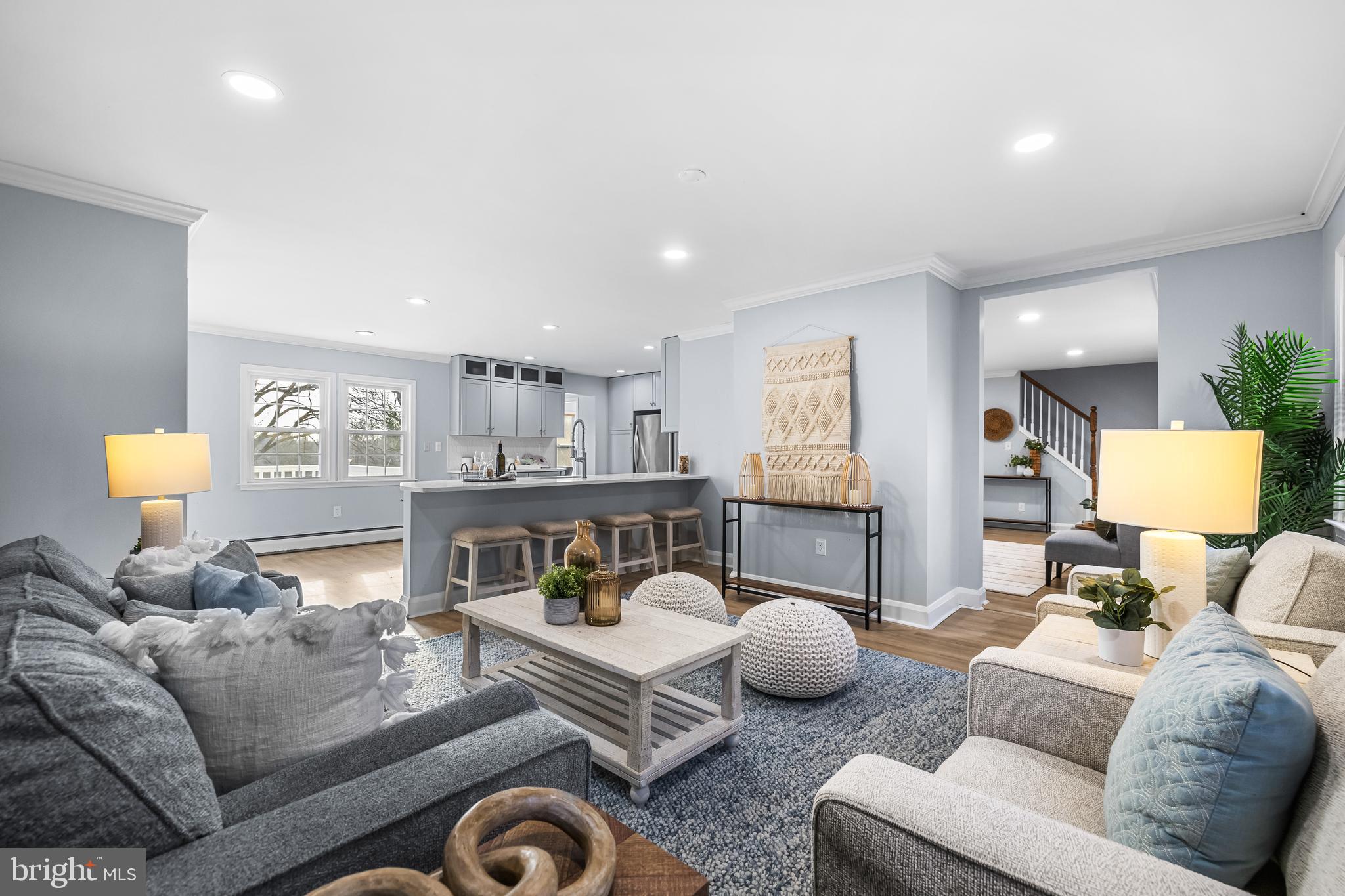 3533 Stansbury Mill Road Phoenix, MD 21131 - Photo 11 of 47 a living room with furniture and a lamp