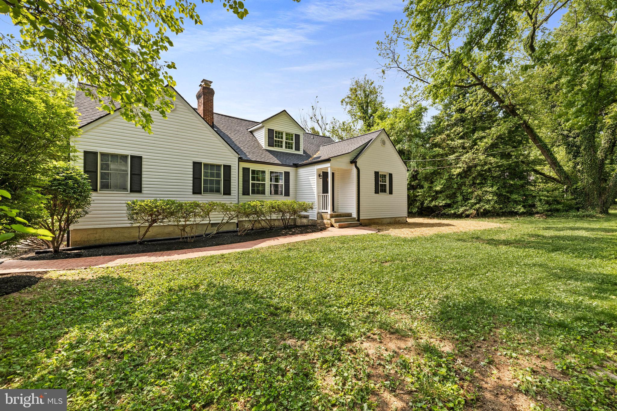 3533 Stansbury Mill Road Phoenix, MD 21131 - Photo 2 of 47 a front view of house with yard and green space